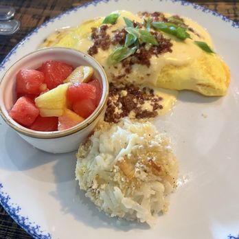 Stillwaters Tavern - St. Petersburg - Daily's bacon & cheddar cheese omelet - New American Near Me - St Petersburg, Florida Stillwaters Tavern - St. Petersburg - Daily's bacon & cheddar cheese omelet - New American Near Me - St Petersburg, Florida