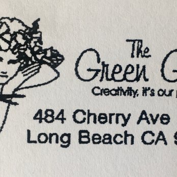 The Green Genie - a woman holding a bouquet of flowers - Gardeners Near Me The Green Genie - a woman holding a bouquet of flowers - Gardeners Near Me