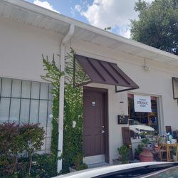 Delightfully Strange Finds - Front of the shop. Beautiful vines and cool finds!