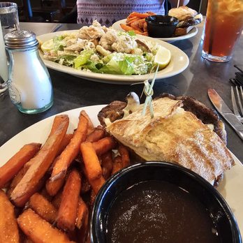 The Old Whiskey Mill - Half french dip, au jus, sweet potato fries,  and chicken caesar salad - Brasseries Near Me - Port Townsend, Washington