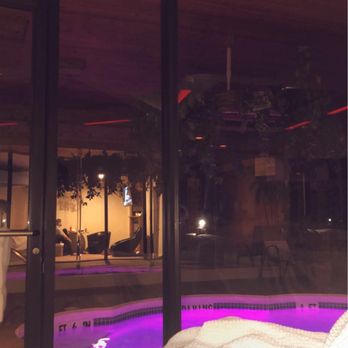 Sybaris Pool Suites - View of pool from the bed - Hotels Near Me - Indianapolis, Indiana
