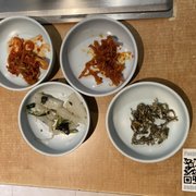 Photo of Mo Ran Gak Restaurant - Garden Grove, CA, United States. More side dishes included in the combination order. QR code on the table ends.