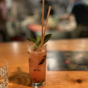 Co Nam - a cocktail with a straw and mint - Vietnamese Near Me - Oakland, California Co Nam - a cocktail with a straw and mint - Vietnamese Near Me - Oakland, California