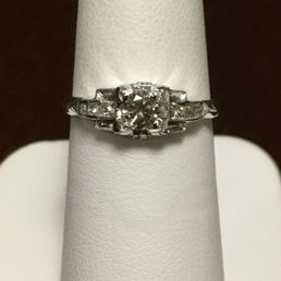 Perfectly priced, custom antique ring with a new salt and pepper centerstone and new channeled side stones.