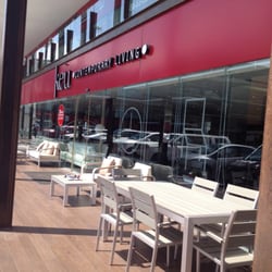 Keu Contemporary Living - Fachada y exposición de muebles