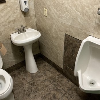 Rancho Grande Restaurant - tiny men's restroom, with sink located between toilet and urinal - Mexican Near Me - Olive Branch, Mississippi Rancho Grande Restaurant - tiny men's restroom, with sink located between toilet and urinal - Mexican Near Me - Olive Branch, Mississippi