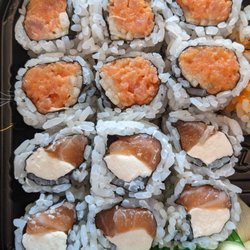 Spicy Tuna Roll (Top), Philadelphia Roll (Bottom)