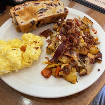 The Biscuit - Lily's Chicken Apple Hash with scrambled eggs and Cranberry Raisin Toast - Breakfast & Brunch Near Me - Holland, Michigan The Biscuit - Lily's Chicken Apple Hash with scrambled eggs and Cranberry Raisin Toast - Breakfast & Brunch Near Me - Holland, Michigan