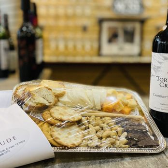 Wine Attitude - a bottle of wine and a tray of food - Wine Bars Near Me - El Paso, Texas
