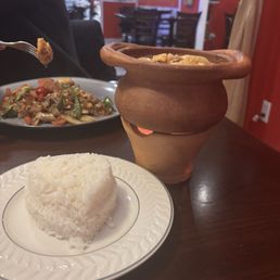 Drunken noodles in the background. Massaman curry and jasmine rice in the front.