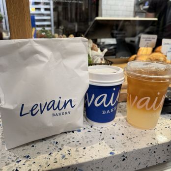 Levain Bakery - NoHo, NYC - Coffee, yea and cookies to go because there's nowhere to sit. - Bakeries Near Me - New York, New York
