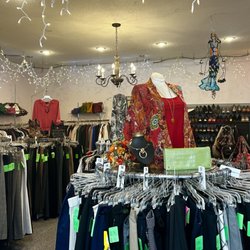 My Sisters Closet - Boutique's professional room, featuring a gorgeous glass sculpture  lovingly given by a MSC supporter.