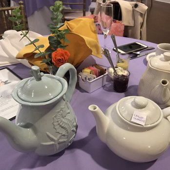 Spring Tea Garden - Our teapots. A flower. The menu. Our table. Not the super cutest stuff, but it was still a good experience. - Tea Rooms Near Me - Fullerton, California
