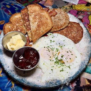 Continues Arcade - "Saturday Morning" (2 eggs, 2 strips of crispy bacon, chicken sausage, rye toast) - Bars Near Me - Alexandria, Virginia Continues Arcade - "Saturday Morning" (2 eggs, 2 strips of crispy bacon, chicken sausage, rye toast) - Bars Near Me - Alexandria, Virginia