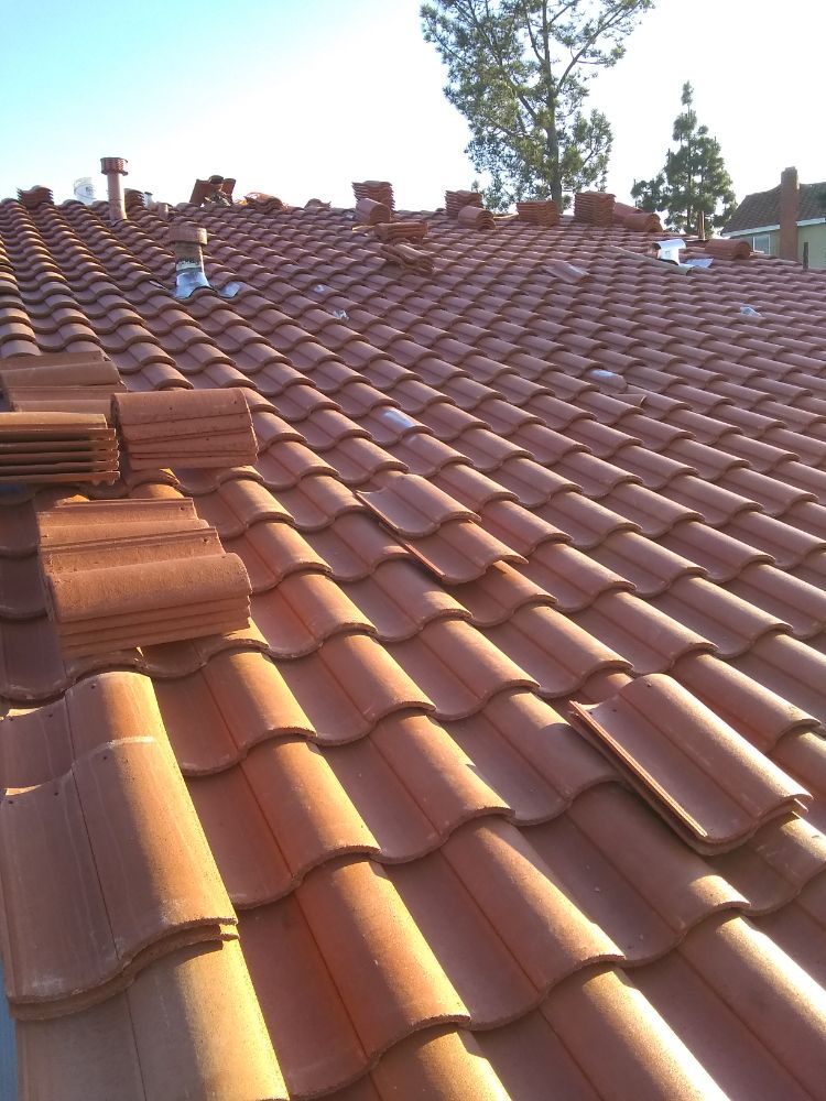 Slide of Tello's Roofing