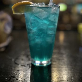 Finn MacCool's Irish Bar - a blue drink with a slice of lemon - Irish Pub Near Me - Houston, Texas Finn MacCool's Irish Bar - a blue drink with a slice of lemon - Irish Pub Near Me - Houston, Texas