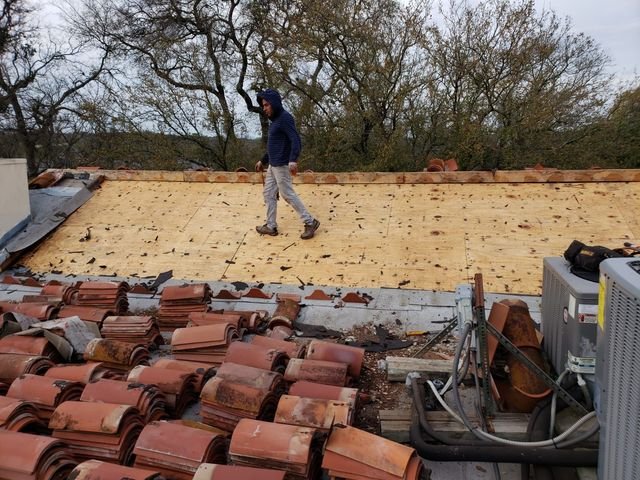 Slide of EJM Roofing & Remodeling