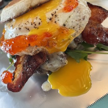 Fork & Spoon - Toasted English muffin, fennel sausage, over easy egg, red pepper jelly, thick maple bacon & arugula - Food Trucks Near Me - Cartersville, Georgia Fork & Spoon - Toasted English muffin, fennel sausage, over easy egg, red pepper jelly, thick maple bacon & arugula - Food Trucks Near Me - Cartersville, Georgia