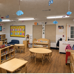 Bright and colorful preschool classroom at Childcare Network with age-appropriate learning materials