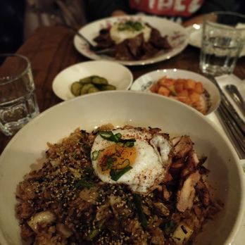 Soju - Korean Chicken fried rice w/ fried egg. Bulgogi w/ banchan far end. - Korean Near Me - Pittsburgh, Pennsylvania