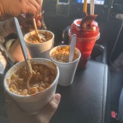 Paleteria Michoacana - 2 small elote and one medium elote  with a fresa Mangonadas