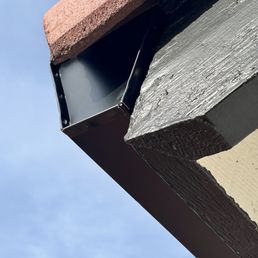 Above 2nd story, new gutter
