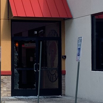 Popeyes Louisiana Kitchen - Broken glass door. Workers need to be a little more humble. - Fast Food Near Me - Randolph, Massachusetts