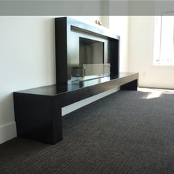 Coulee Concrete Designs - Black concrete fireplace surround