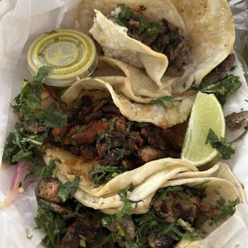 El Puestito - Top to bottom: steak, al pastor and chicken tacos. - Latin American Near Me - Danbury, Connecticut