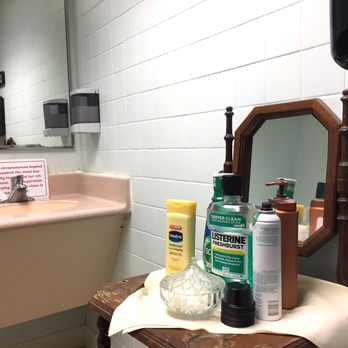 Rudy's Smokehouse - Men's restroom with centrally placed man amenities. - Barbeque Near Me - Springfield, Ohio