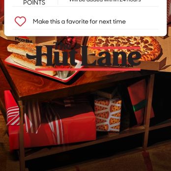 Pizza Hut - a pizza on a table with a pizza on it - Pizza Near Me - Fairview, Tennessee Pizza Hut - a pizza on a table with a pizza on it - Pizza Near Me - Fairview, Tennessee