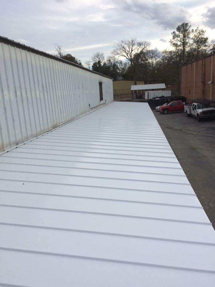 Slide of Patch Adams Roofing