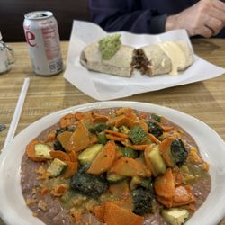 Restaurante Oaxaqueno - My friend had a traditional burrito. I had the Burrito  Oaxaqueno with corn tortillas on the side instead of wrapped and rice and beans.