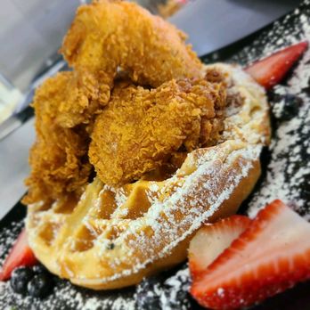 Fin & Feathers - CHICKEN & WAFFLE your choice of crispy fried chicken: three juicy wings OR one tender, flavorful thigh. Served with your favorite syrup. - Soul Food Near Me - Albany, Georgia