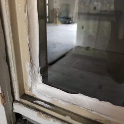 Mesko Glass - I wish I'd just said leave it, I'll do the caulk myself.