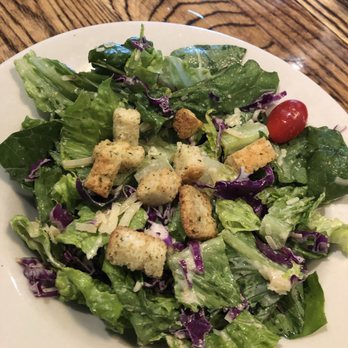 Harrigan’s - Caesar salad?!! Why are there tomatoes and cabbage in here? - Steakhouses Near Me - Lubbock, Texas