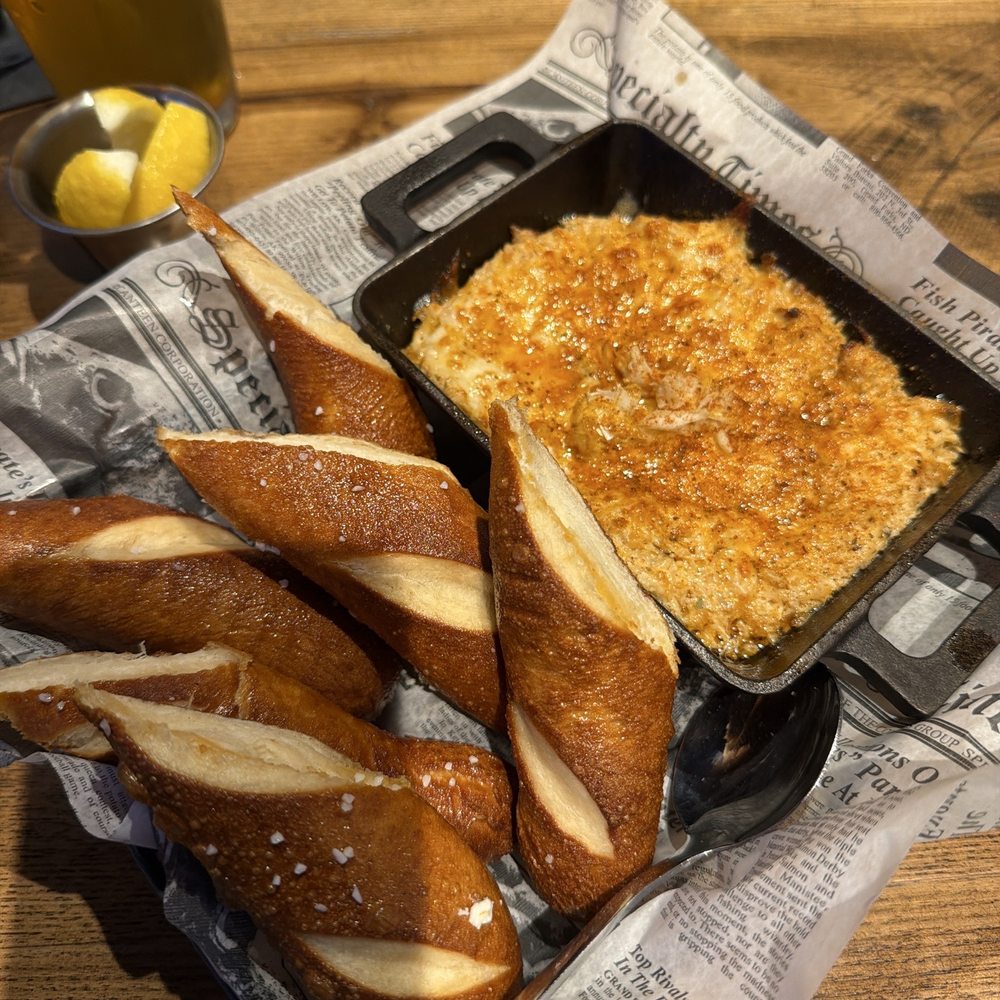 The Greene Turtle - Crab dip with pretzels sticks - American Near Me - Tampa Bay, Florida The Greene Turtle - Crab dip with pretzels sticks - American Near Me - Tampa Bay, Florida