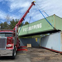 Chris' Service Center - Our rotating crane wreckers can handle any lifting needs