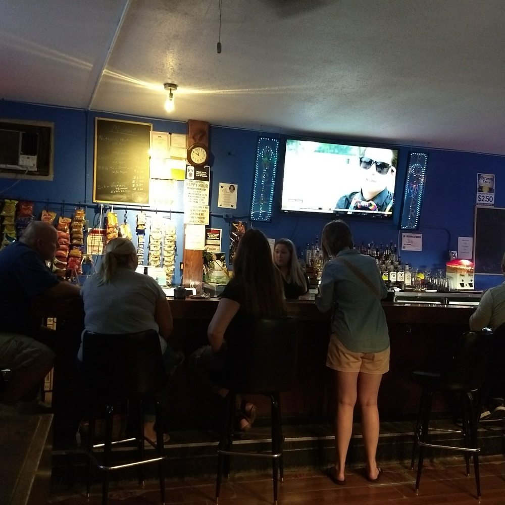Uncle Fester's - a group of people sitting at a bar - Burgers Near Me - West Allis, Wisconsin Uncle Fester's - a group of people sitting at a bar - Burgers Near Me - West Allis, Wisconsin