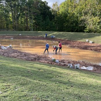 Delcid Erosion Control - Planting of vegetation post sod installation - Landscaping Near Me