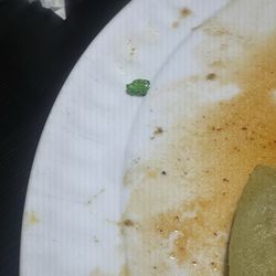 Las Casitas Grill - A piece of glass my pupusas.
