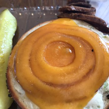 Bagels & Cream Norton - Bagel melt on everything bagel. Chive cream cheese, tomato, red onion, cheddar cheese. Delish! - Breakfast & Brunch Near Me - Norton, Massachusetts