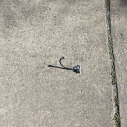 Comcast Service Center - Xfinity service truck left component on sidewalk before leaving curb.