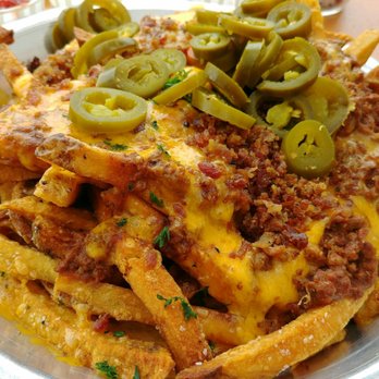 Rodeo Goat - Cheese fries with surprise (with chili)....perfect for sharing! - Burgers Near Me - Dallas, Texas Rodeo Goat - Cheese fries with surprise (with chili)....perfect for sharing! - Burgers Near Me - Dallas, Texas