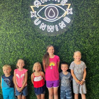 Sabbath Coffee Roasters - Kids next to the sabbath wall - Coffee & Tea Near Me - Clawson, Michigan
