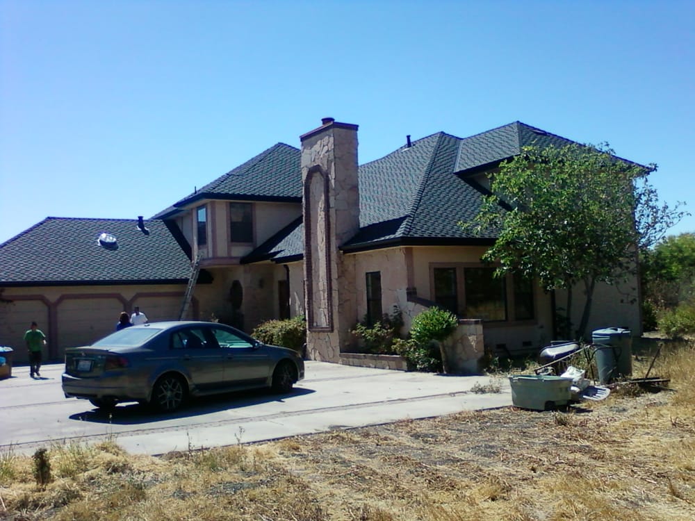 Slide of Landmark Roofing