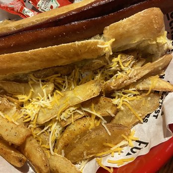 Fuddruckers - I asked for cheese fries and they like cold shredded cheese on warm fries it didn't melt - American Near Me - Miami, Florida