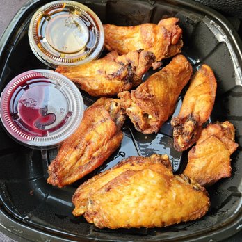 Cowbell Rock Row - Chicken Wings with Teriyaki Sauce and Blueberry Habenaro sauce both on side - Sports Bars Near Me - Westbrook, Maine Cowbell Rock Row - Chicken Wings with Teriyaki Sauce and Blueberry Habenaro sauce both on side - Sports Bars Near Me - Westbrook, Maine