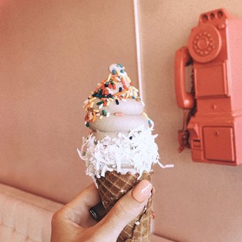 Fluffy Bear - Cookie and Cream cone with sprinkles and coconut shreds - Ice Cream & Frozen Yogurt Near Me - Laguna Hills, California Fluffy Bear - Cookie and Cream cone with sprinkles and coconut shreds - Ice Cream & Frozen Yogurt Near Me - Laguna Hills, California