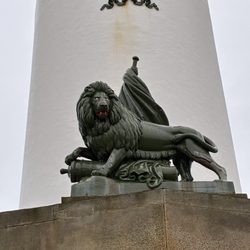 Egmond aan Zee - Lion statue at the base of the lighthouse